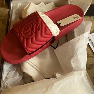 Men’s size 8 red Gucci slides